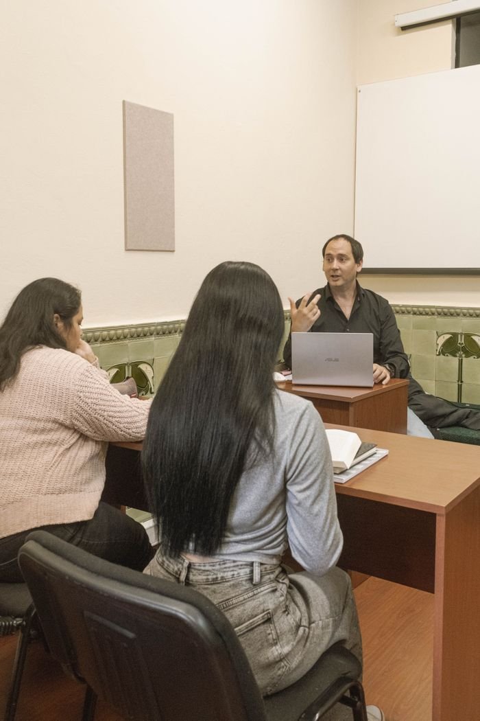 about-us Teacher and students engaged in a classroom discussion in Montevideo, Uruguay.